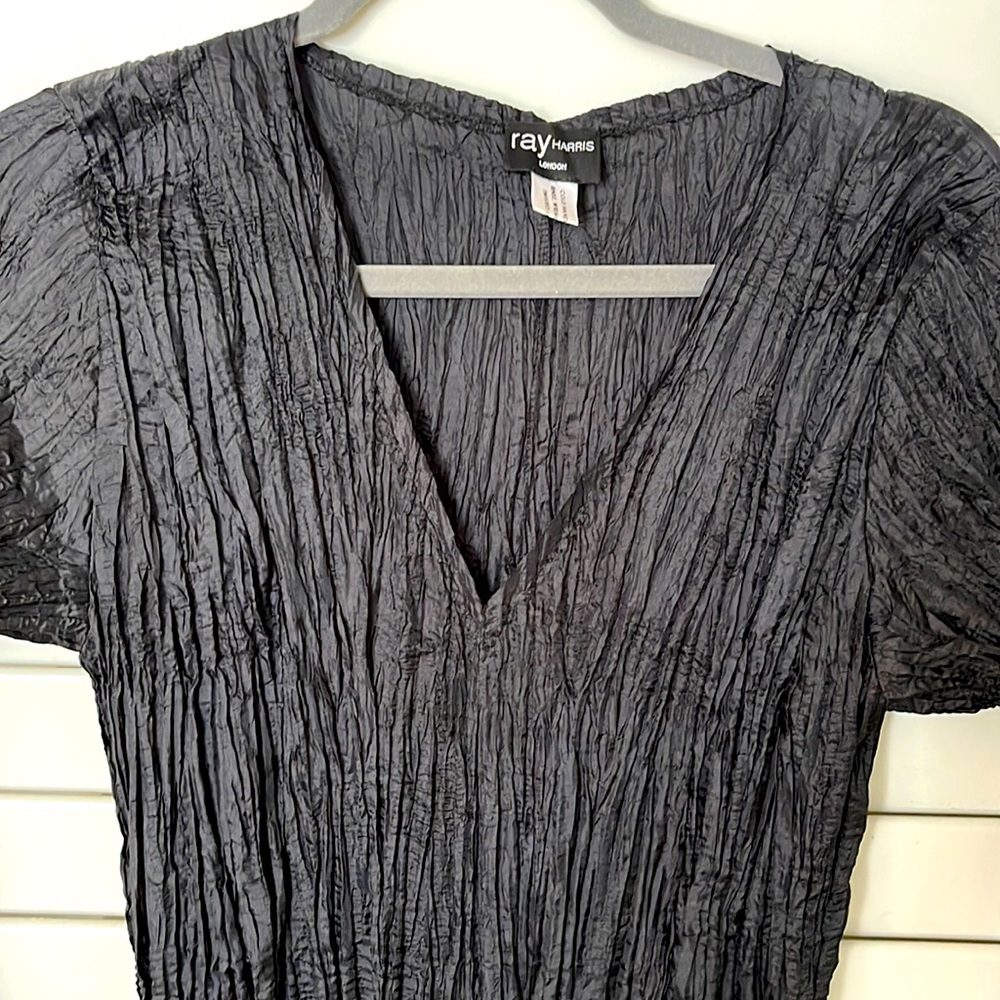 New. Never worn. Very versatile. No need to iron.